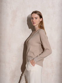 Maglione in maglia di lurex con scollo a V