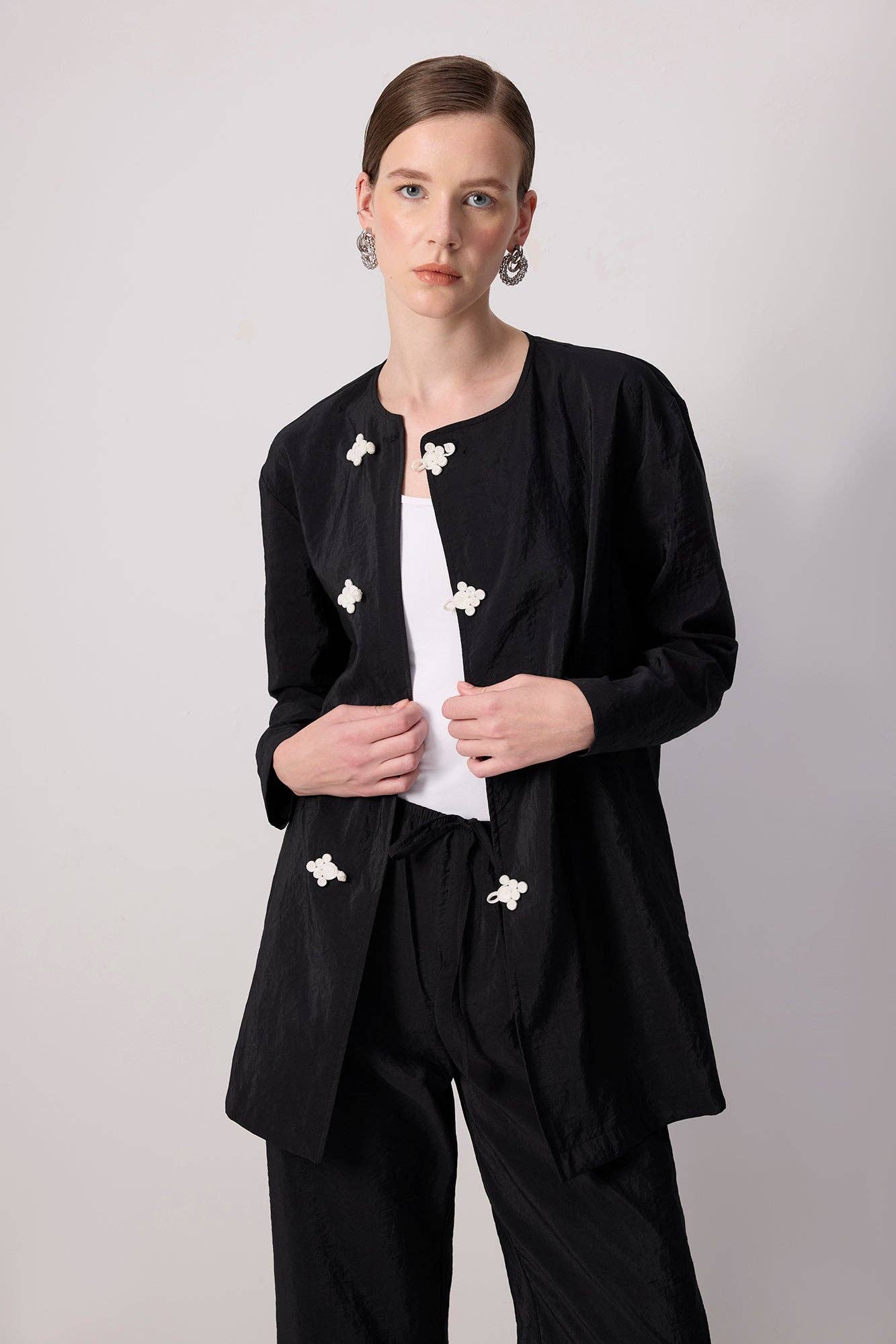 Set tunica e pantaloni in cupro