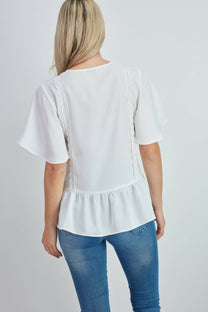 Camicia bianca con inserto in pizzo e balza