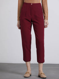 Pantaloni cropped bordeaux con bottoni dorati