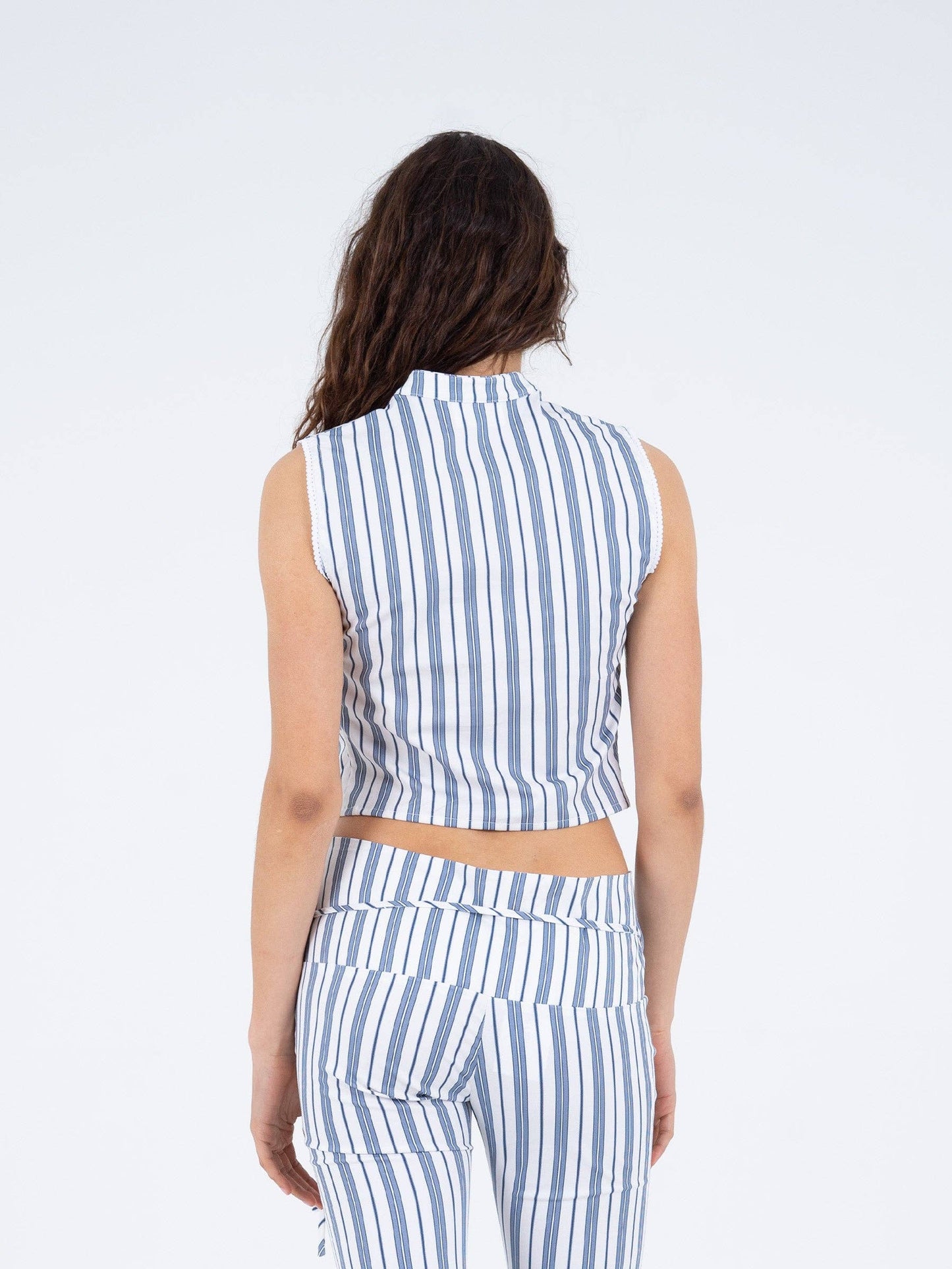 Top smanicato a righe con fiocchi Area