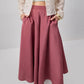 Gonna lunga svasata rosa con tasche