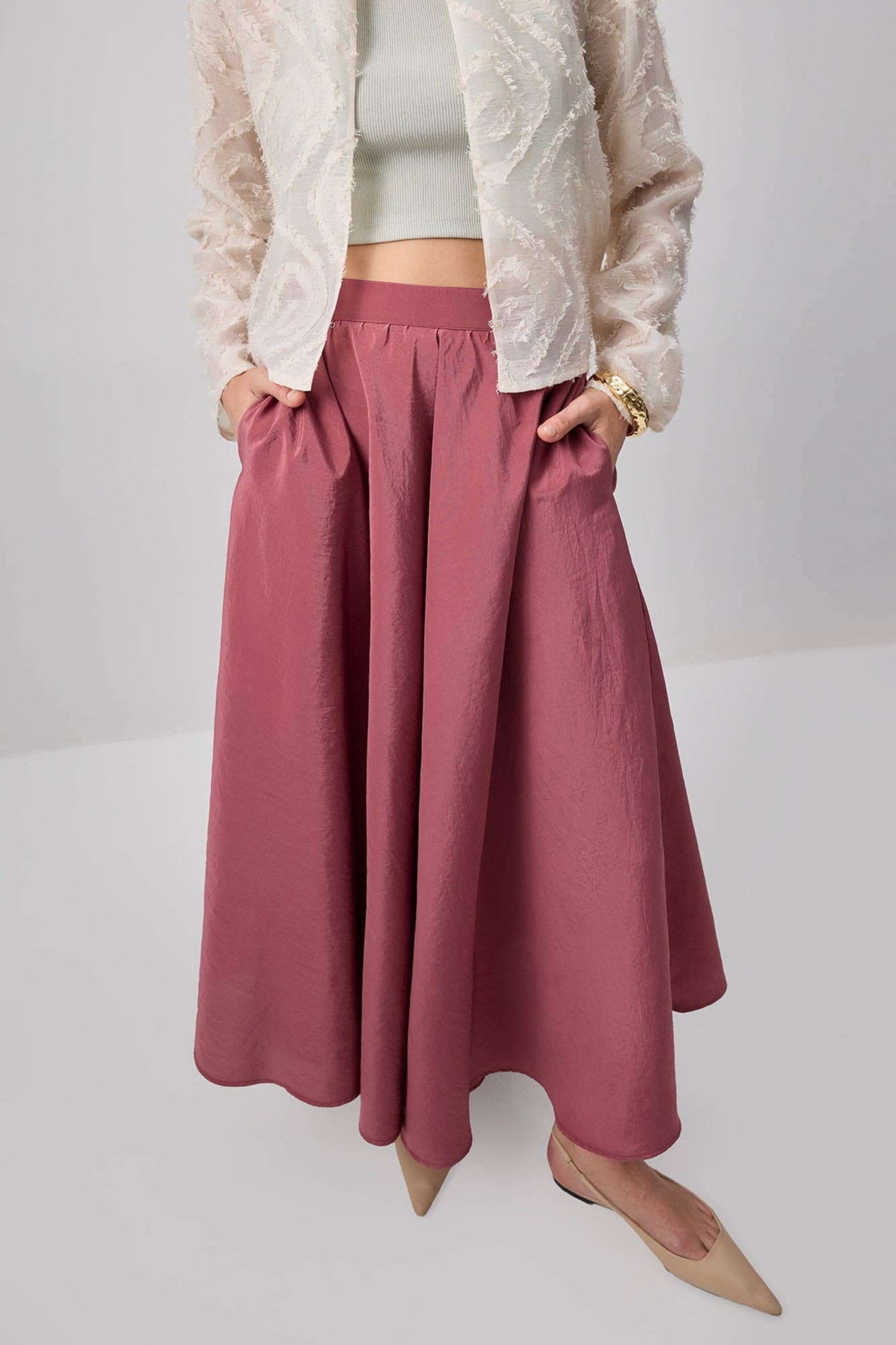 Gonna lunga svasata rosa con tasche