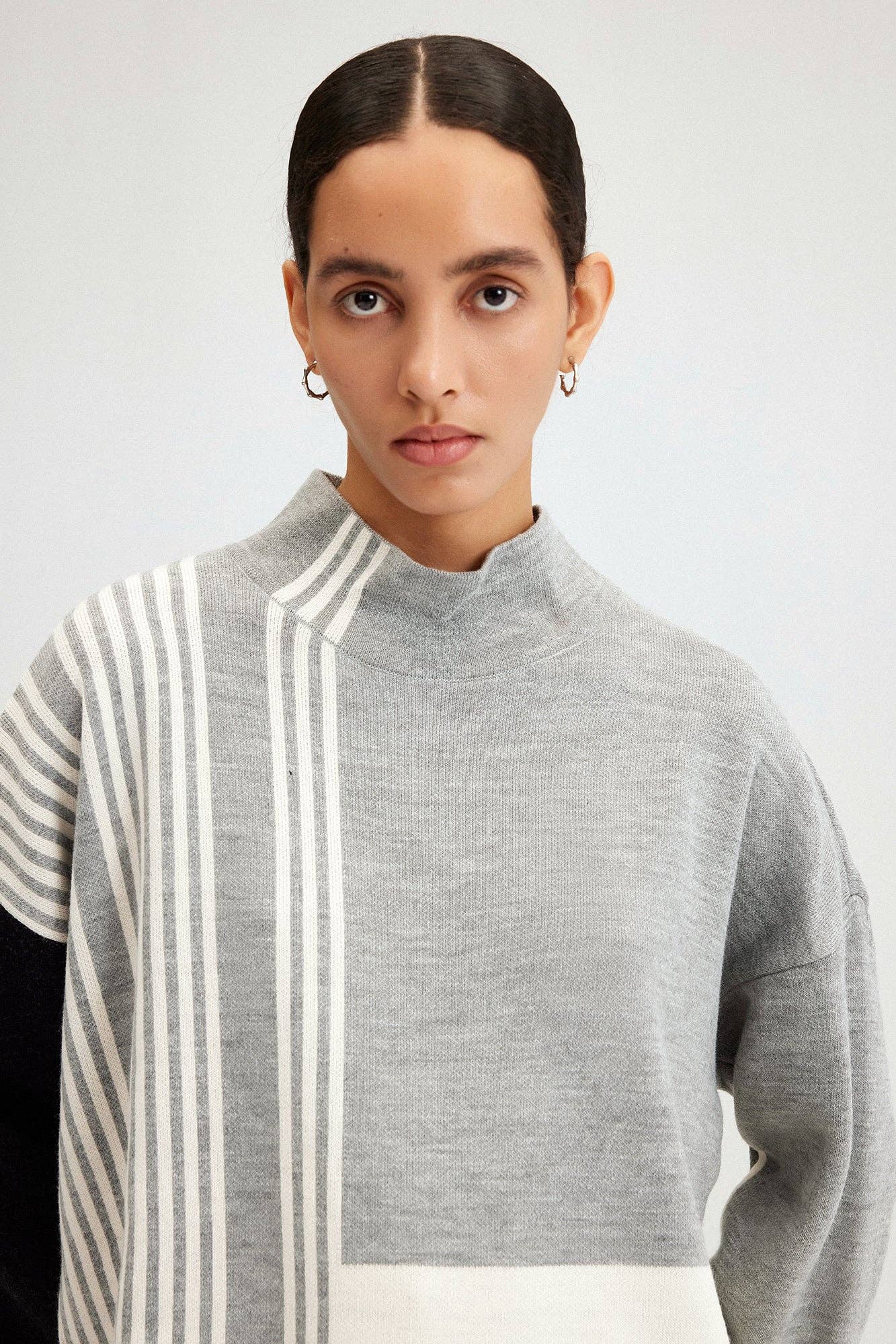 Tunica in maglia con fascia al collo