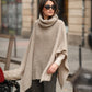 Poncho in maglia con collo alto