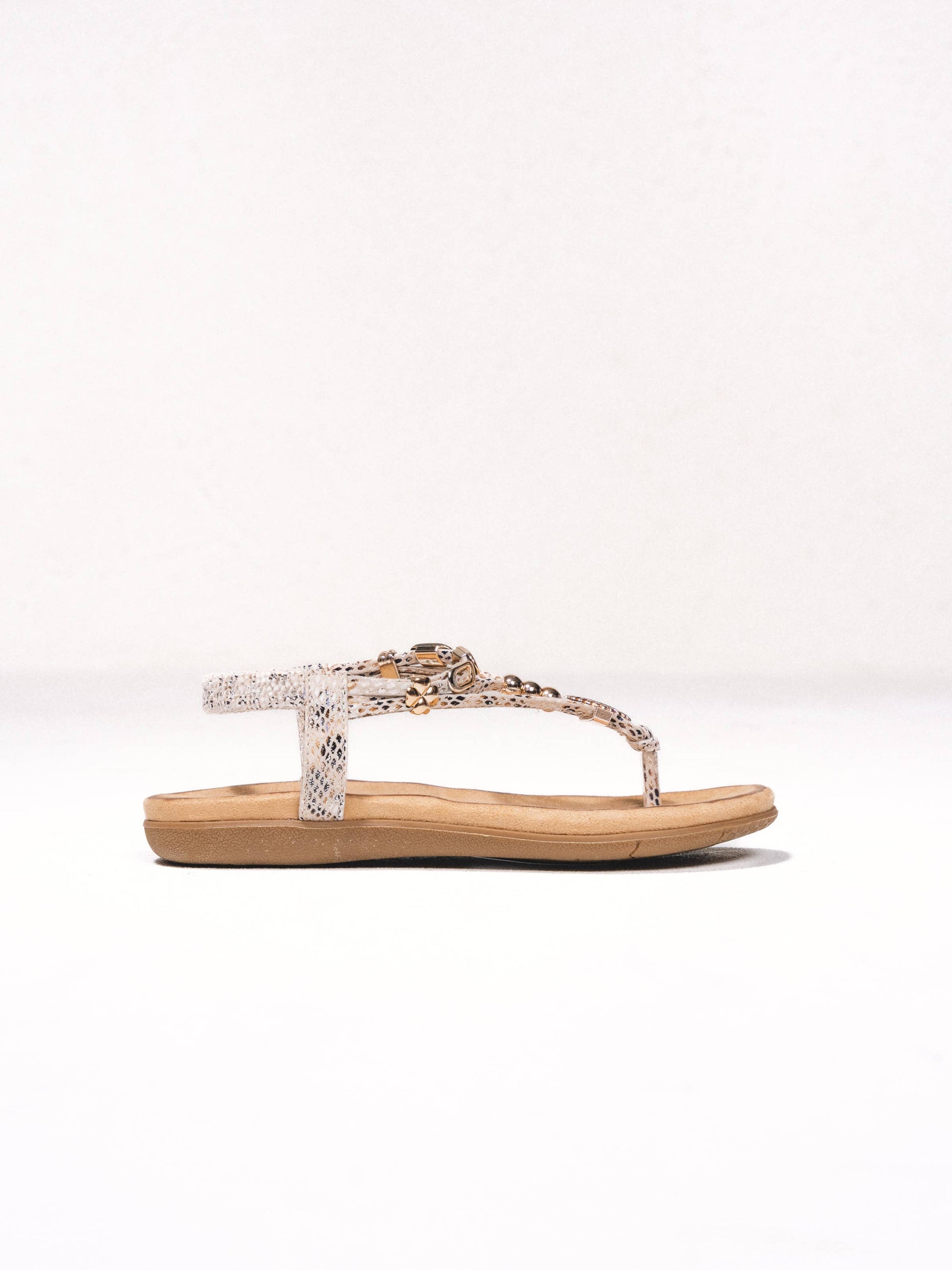 Sandali flat animalier con applicazioni metalliche