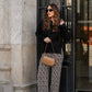 Cardigan nero a coste con bottoni