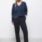 Pantaloni sartoriali essenziali con tasche oblique