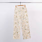 Pantaloni wide leg con ricamo floreale e paillettes