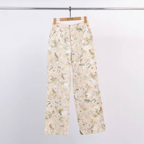 Pantaloni wide leg con ricamo floreale e paillettes