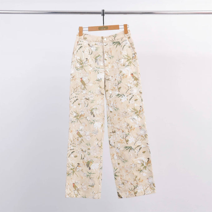 Pantaloni wide leg con ricamo floreale e paillettes