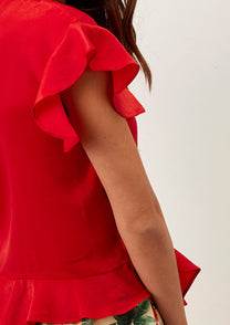 Top incrociato rosso con volant