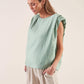 Blusa con spalline strutturate