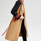 Trench color block con cintura