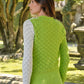 Cardigan in cotone bicolor traforato con laccetti