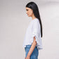Blusa fluida con maniche a volant plissé