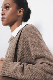 Maglione in lana a trecce