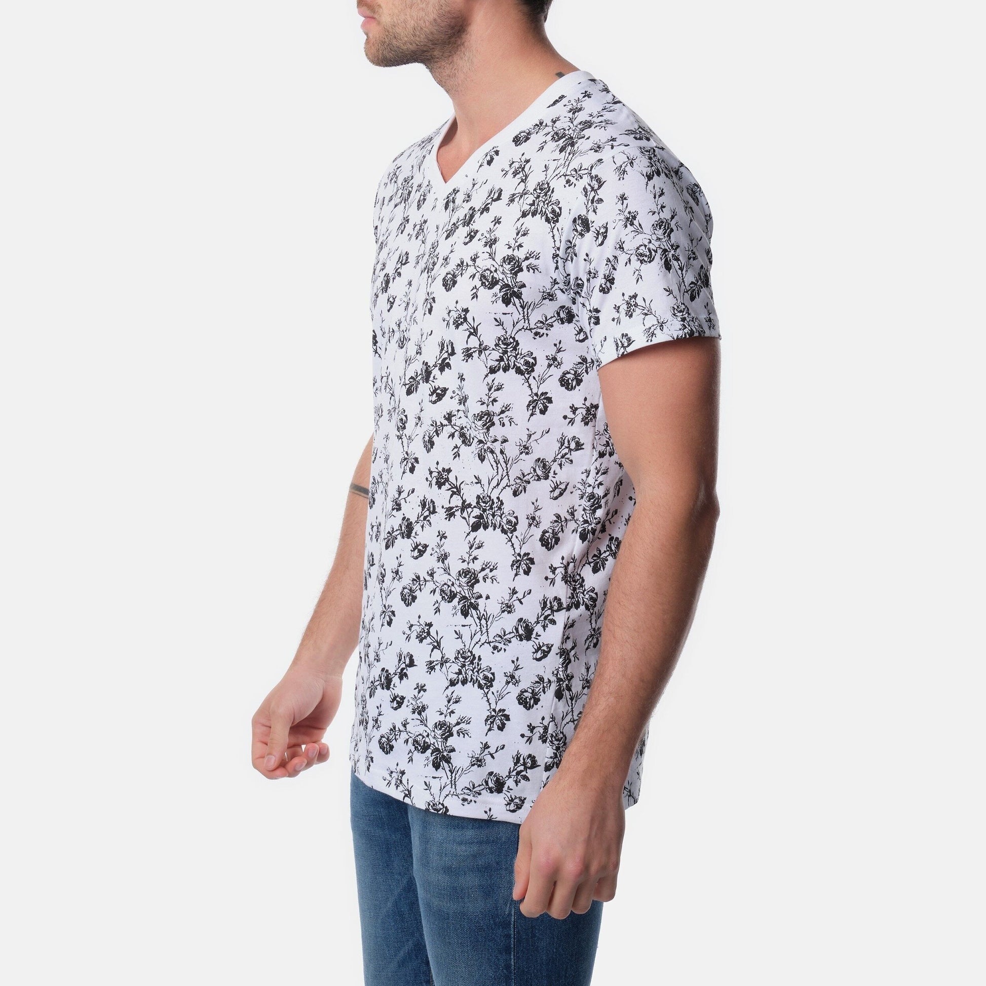T-shirt uomo bianca con stampa floreale e scollo a V