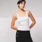 Top in maglia a coste con profili a contrasto