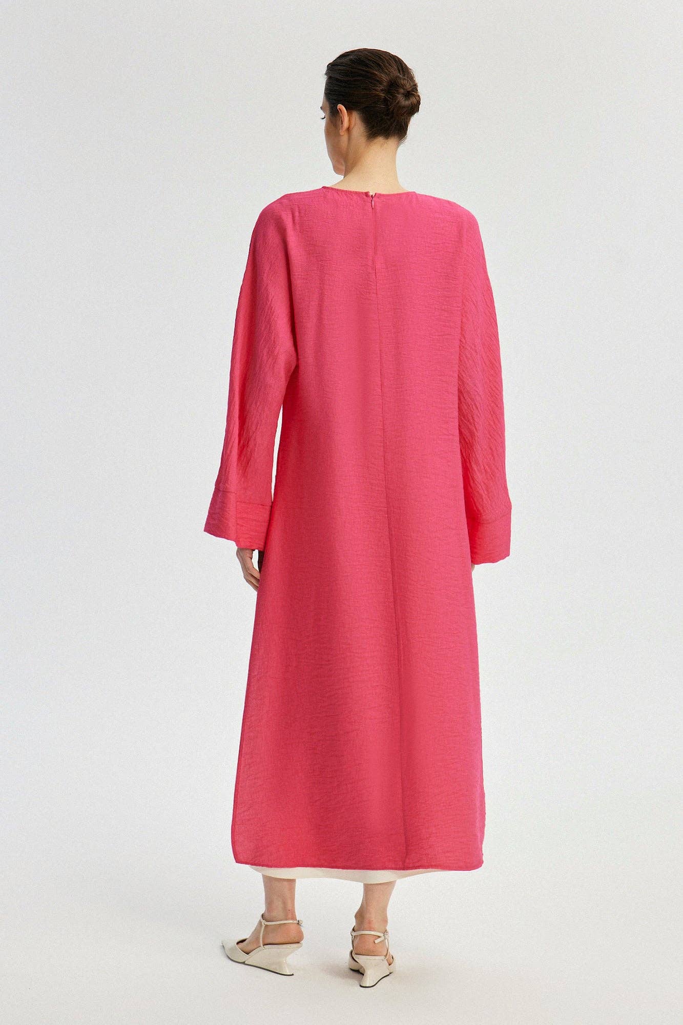 Tunica lunga con spacco frontale fucsia