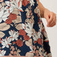 Tunica floreale bicolore con scollo a V