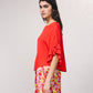 Blusa fluida con maniche a volant plissé