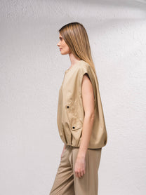 Gilet oversize beige con zip e tasche frontali