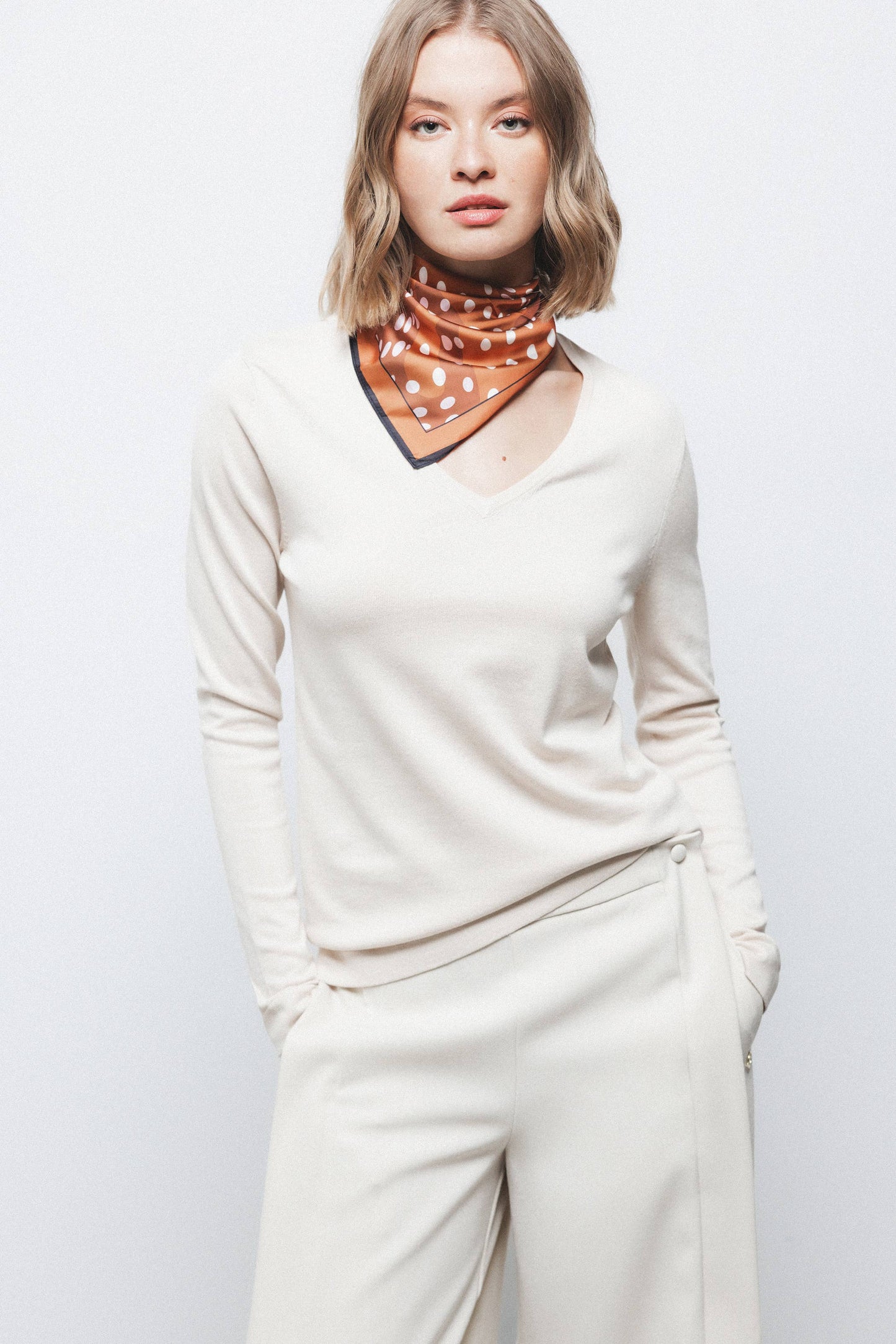 Maglione in maglia rasata con scollo a V