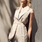 Completo smanicato con gilet cintura e pantaloni palazzo
