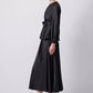 Completo raso nero con blusa peplo e nodo frontale