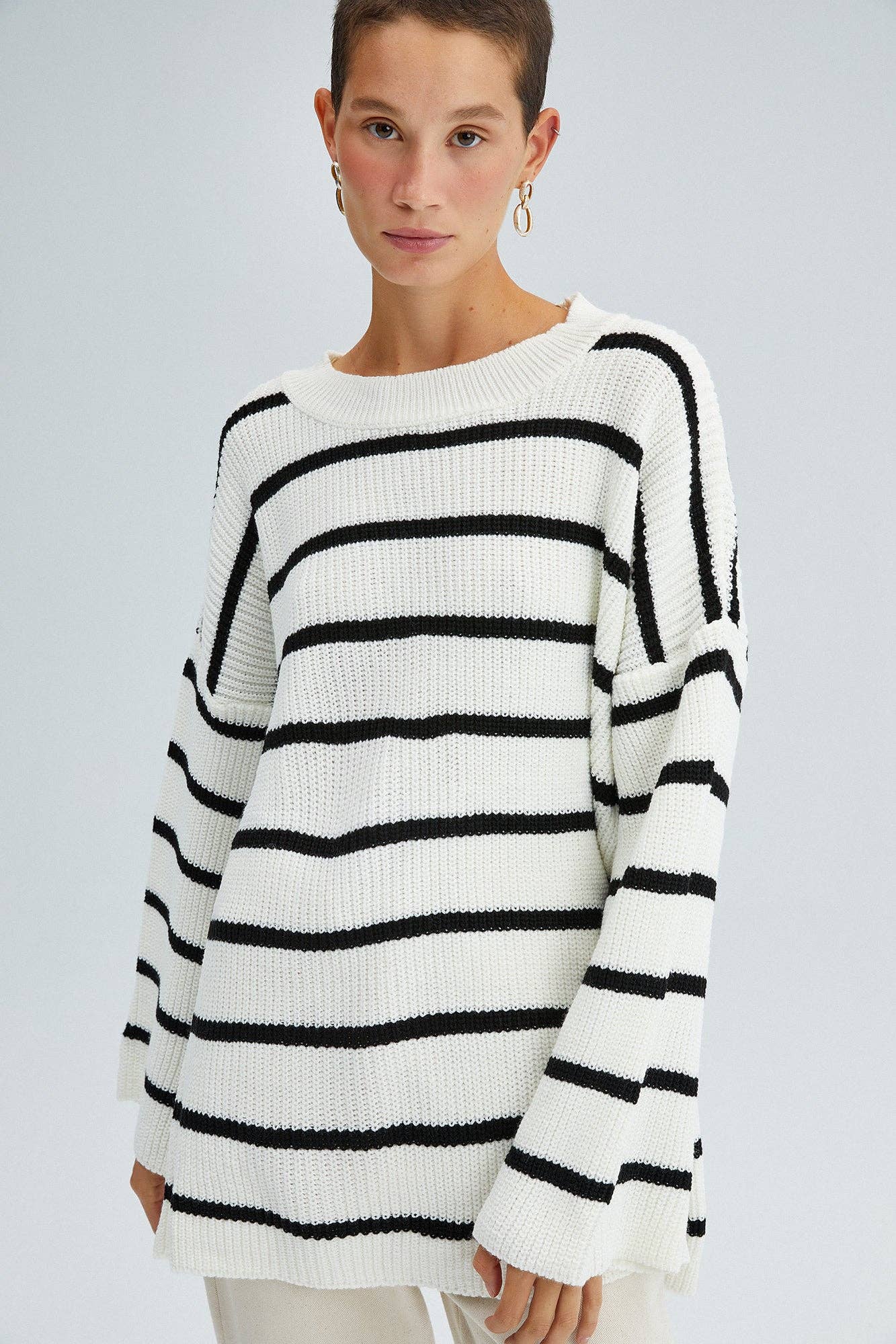 Tunica oversize in maglia a righe
