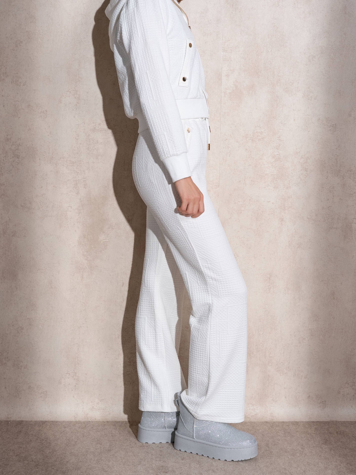 Pantaloni jogger in tessuto matelassé con coulisse