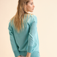 Felpa lunga in maglia con scollo a V