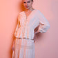 Blusa bianca in cotone con dettagli in pizzo