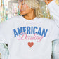Felpa oversize grafica “American Darling”