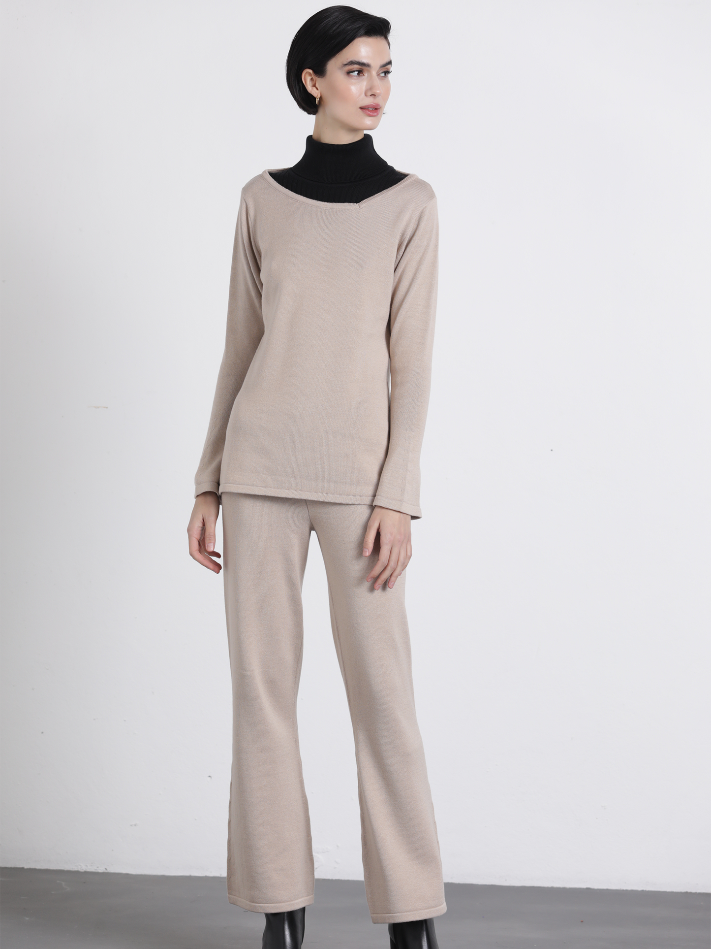 Pantaloni in maglia a zampa