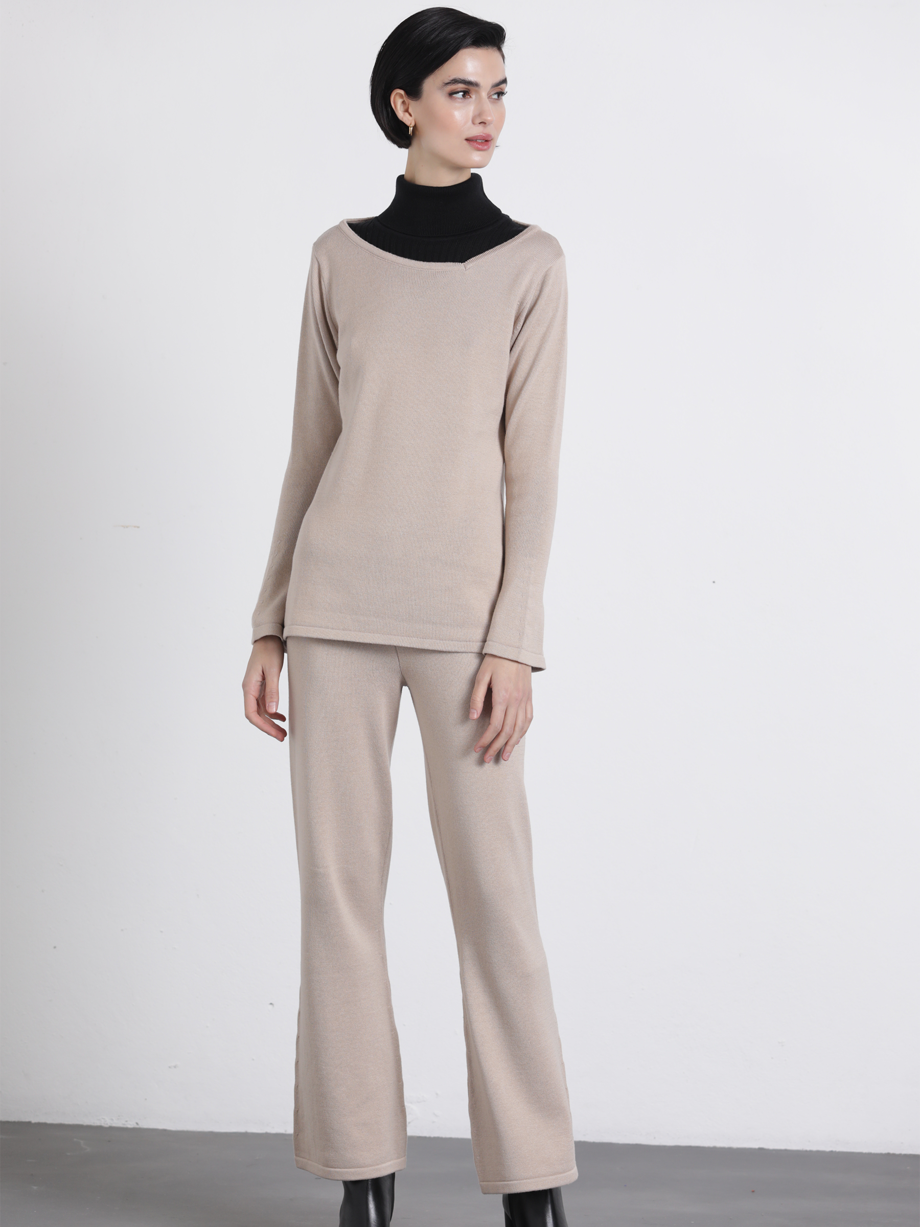 Pantaloni in maglia a zampa
