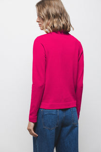 Maglione in maglia rasata con fiocco e scollo a V