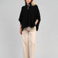 Poncho maglia nero a collo alto con bottoni
