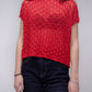 Top corto in crochet traforato dal fit ampio