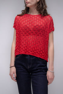 Top corto in crochet traforato dal fit ampio
