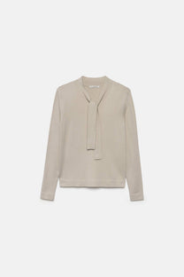 Maglione in maglia rasata con fiocco e scollo a V