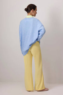Pantaloni a zampa a vita alta giallo pastello con zip laterale