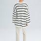Tunica oversize in maglia a righe