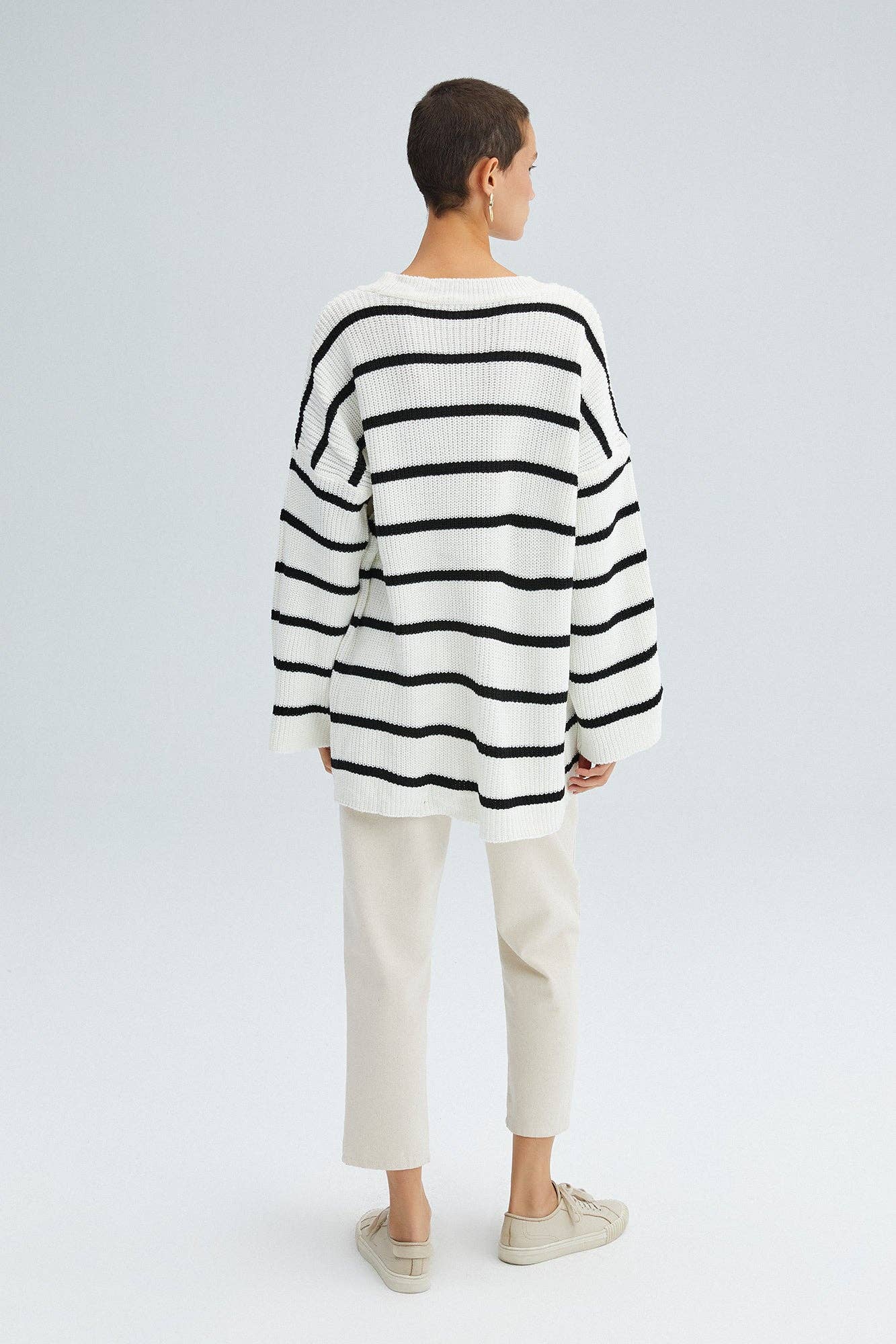 Tunica oversize in maglia a righe