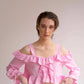 Blusa corta off-shoulder con volant e bottoni