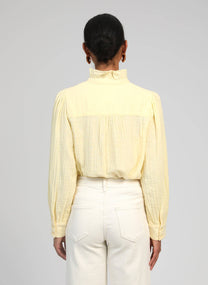Camicia con rouches e collo alto
