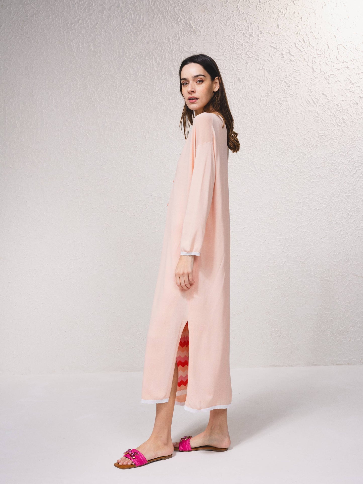 Cappotto lungo in maglia fine con scollo a V