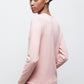 Maglione rosa in maglia rasata con girocollo