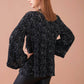 Blusa con balze stampata in viscosa